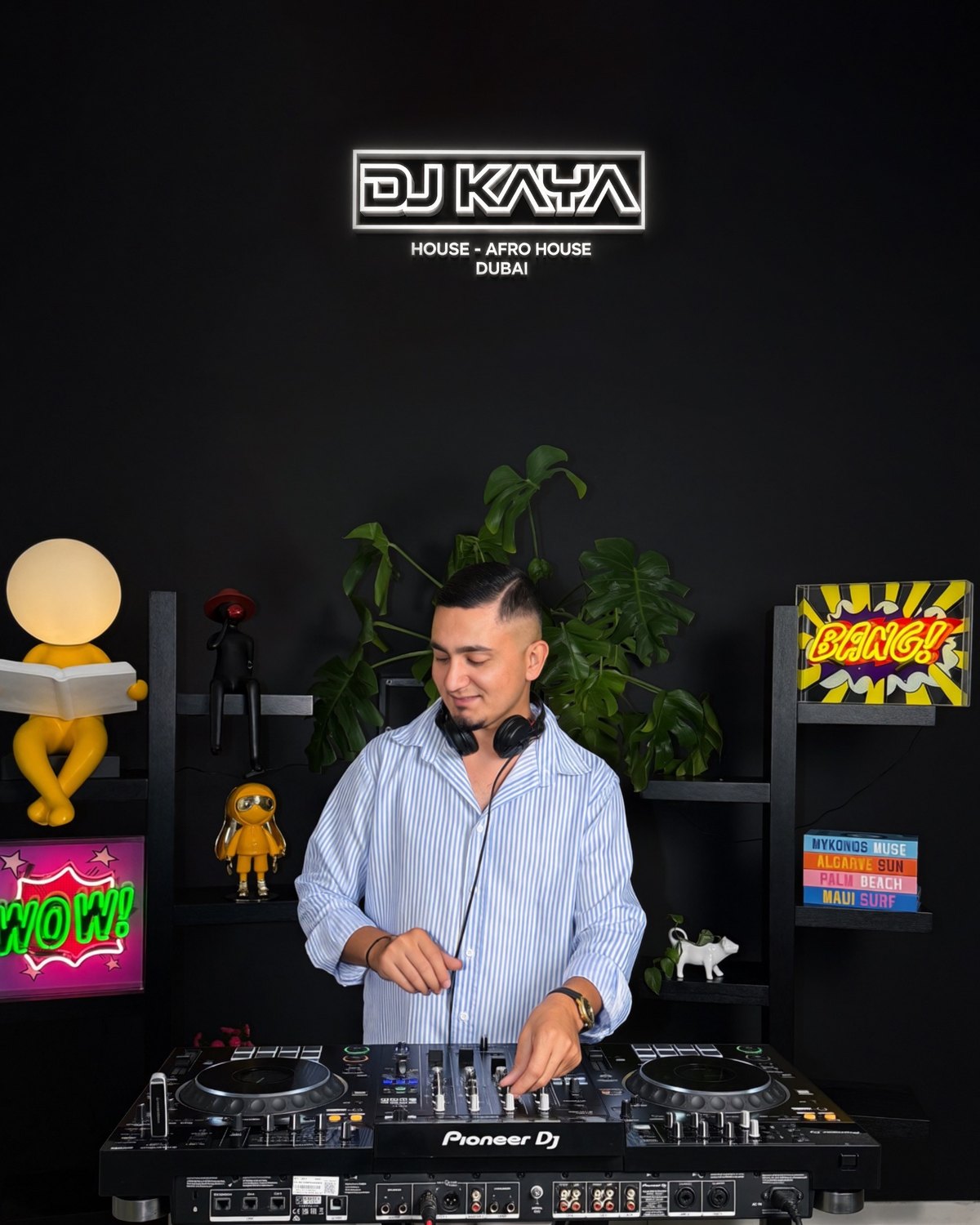 DJ KAYA at a branded DJ booth
