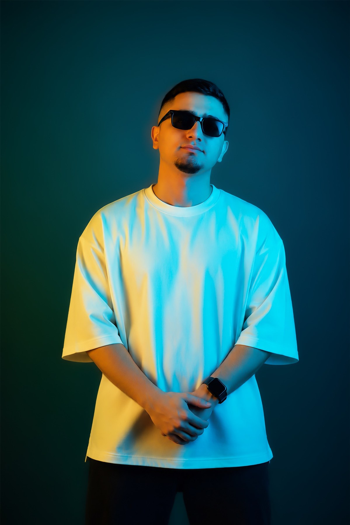 DJ KAYA in a colourful studio portrait